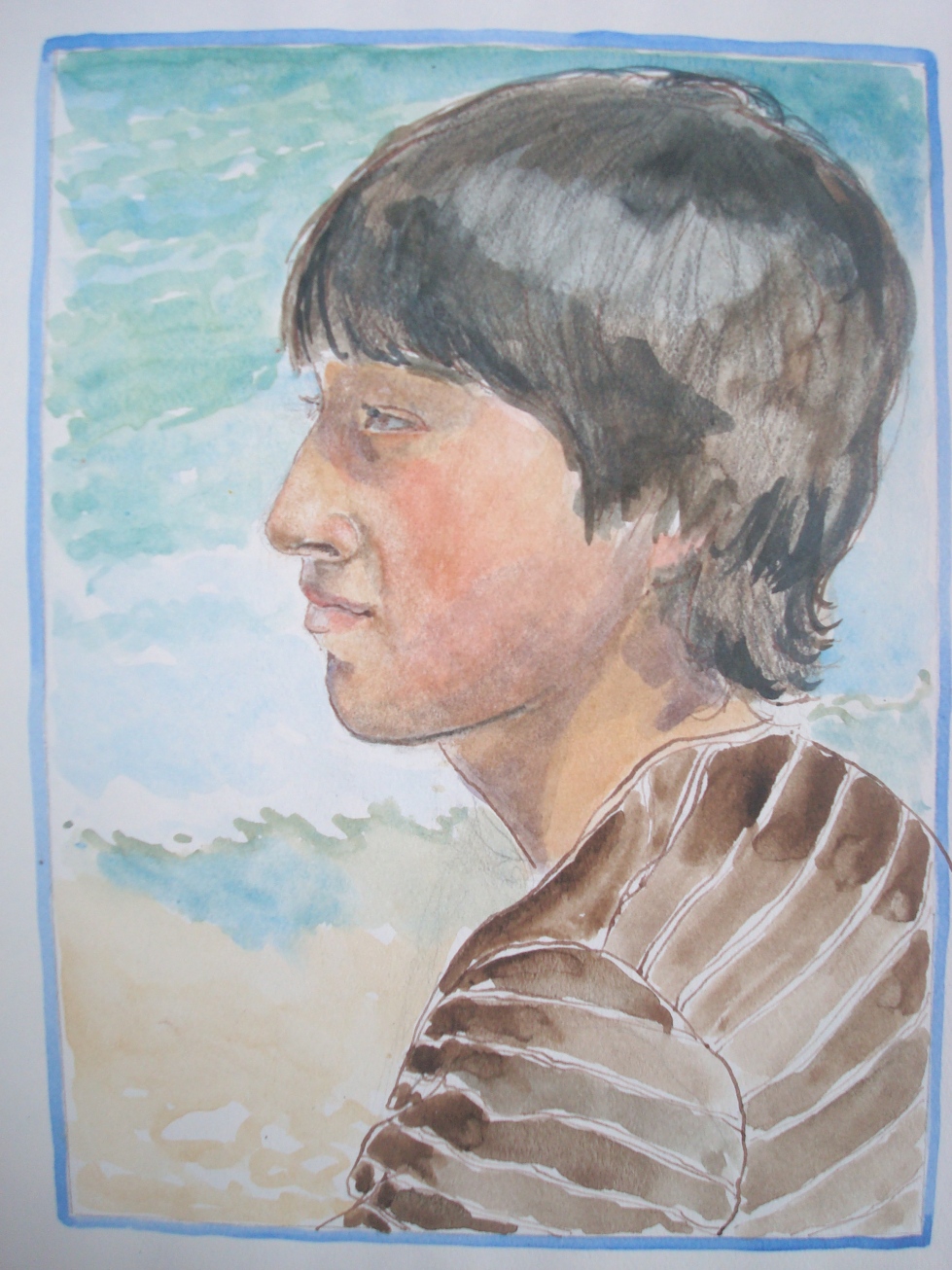 A boy looking out to sea